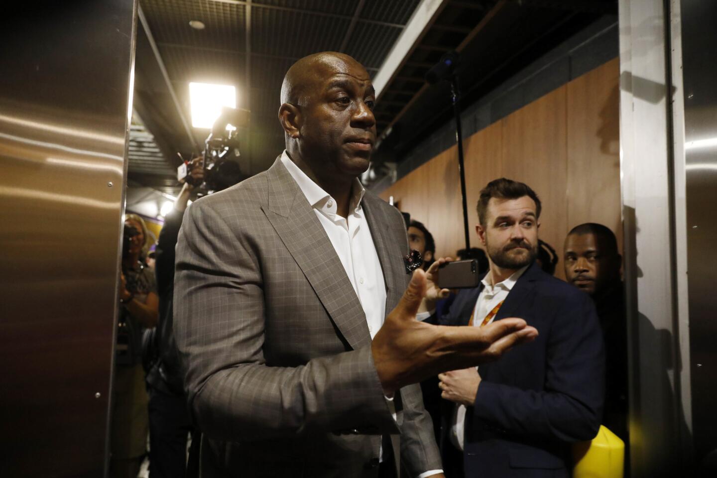 Magic Johnson steps down as Lakers’ president of basketball operations.