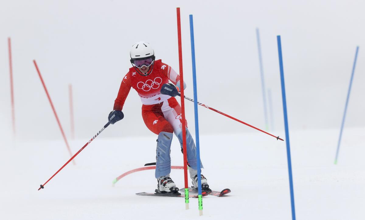 Michelle Gisin skis at the 2022 Olympics.