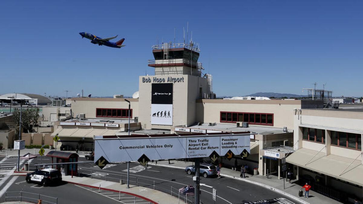 A Southwest airplane takes off over the tower at Bob Hope Airport in Burbank on March 24, 2016. The airfield now is known as Hollywood Burbank Airport.