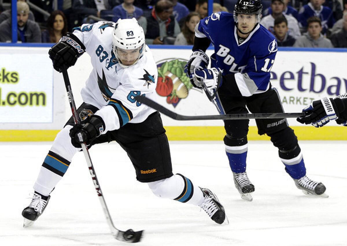 Sharks rookie winger Matt Nieto fires a shot against the Lightning during a game earlier this season. Nieto has 10 goals, 11 assists and a plus-3 rating in 55 games this season.
