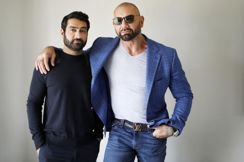 LOS ANGELES, CA JUNE 15, 2019: Portrait of Paired portraits of "Stuber" co-stars Dave Bautista, left, and and Kumail Nanjiani in Los Angeles Ca at the Four Seasons Beverly Hills June 15, 2019. In the film the pair get into hijinks across Los Angeles in the action comedy about a cop recovering from Lasik (Bautista) who enlists his Uber driver (Nanjiani) to help him investigate a case. (Francine Orr/ Los Angeles Times)