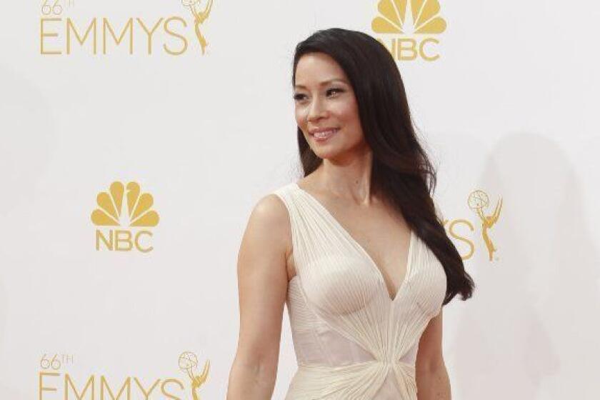 LOS ANGELES, CA., August 25, 2014: Lucy Liu arriving at the 66th Annual Primetime Emmy Awards at Nokia Theatre L.A. LIVE. (Wally Skalij / Los Angeles Times)