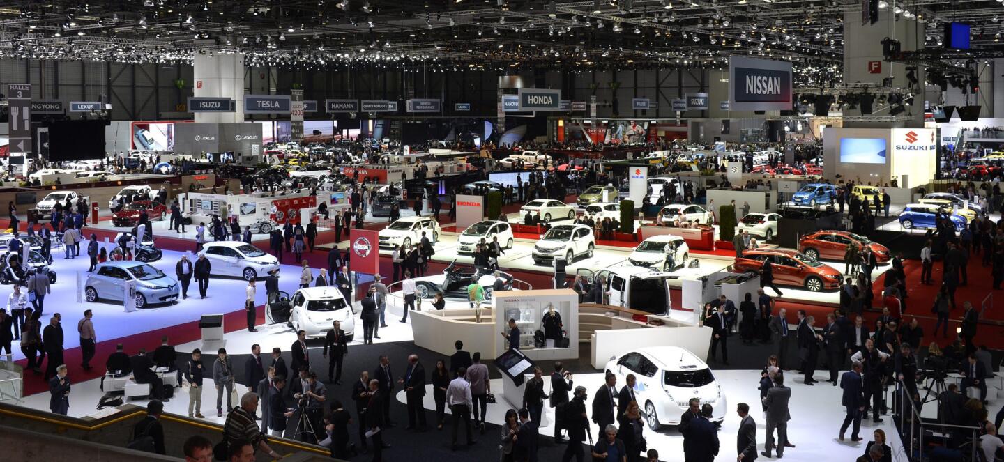 A general view of carmaker's booths and visitors during the press day at the 84th Geneva International Motor Show in Geneva, Switzerland.