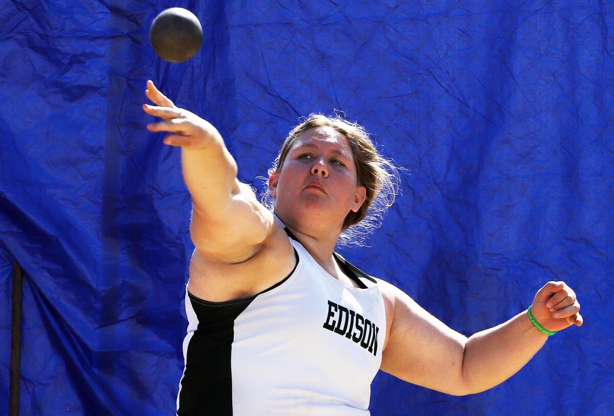 Edison's Alexa Sheldon competes in the shot put at the Orange County track and field championships at Mission Viejo High.