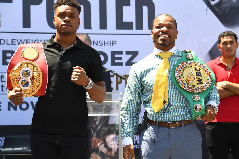 LOS ANGELES, CA - AUGUST 13: IBF Welterweight World Champion Errol Spence Jr. and WBC Welterweight World Champion Shawn Porter face off during a press conference at STAPLES Center Star Plaza to preview their upcoming Welterweight World Championship fight on August 13, 2019 in Los Angeles, California. (Photo by Jayne Kamin-Oncea/Getty Images)