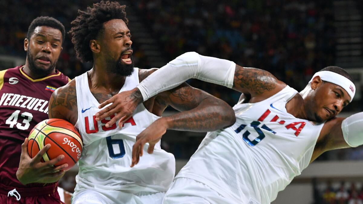 Nobody was going to prevent U.S. center DeAndre Jordan from pulling down this rebound, including teammate Carmelo Anthony, during a Group A game against Venezuela on Monday.