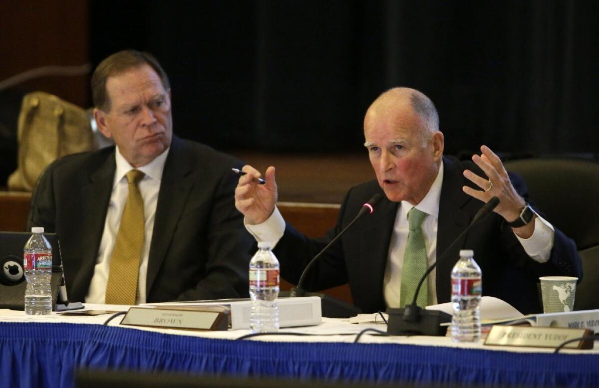 Gov. Jerry Brown speaks at a UC Board of Regents meeting in 2013. On Thursday, the board voted to increase tuition by 5% each of the next five years despite Brown's objections.