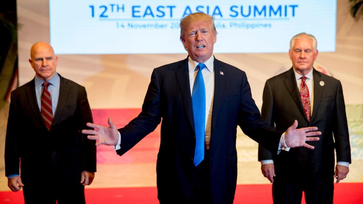 President Donald Trump, accompanied by Secretary of State Rex Tillerson, right, and National Security Adviser H.R. McMaster, left, at the East Asia Summit on Nov. 14 in Manila, Philippines.