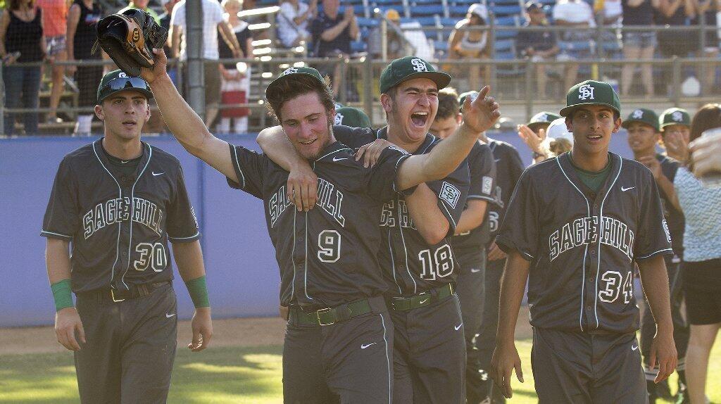 Sage Hill School's Brett Super (9) and Justin Camp (18) celebrate beating Crean Lutheran, 9-0, in the CIF-SS Division 6 baseball championship game at UCR Sports Complex in Riverside on Saturday.