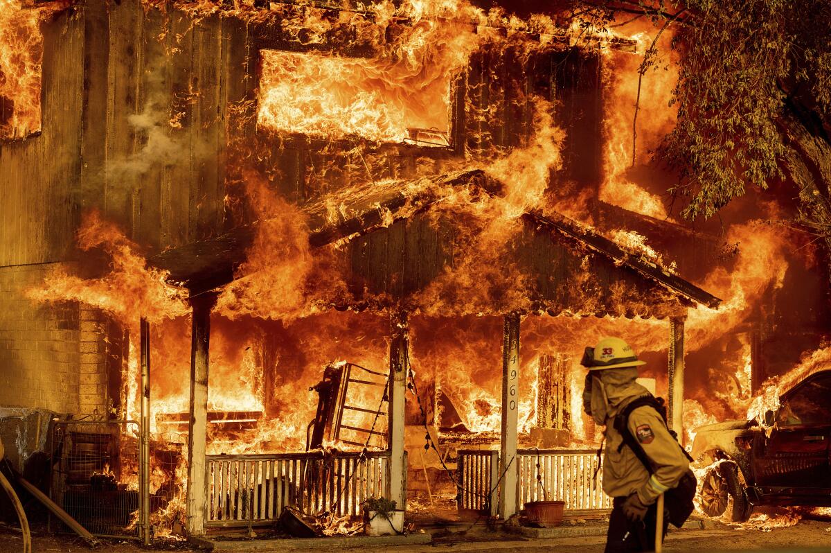 Flames destroy a home