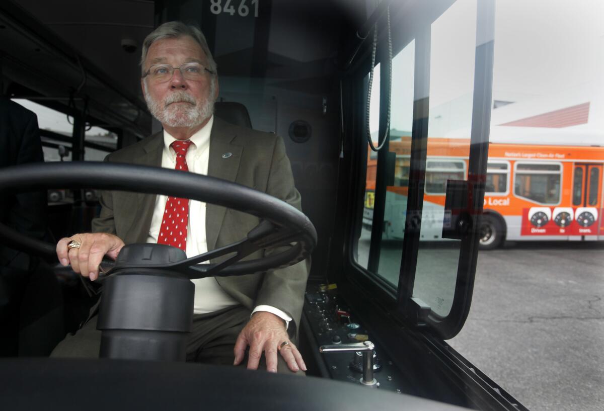 Metro Chief Executive Art Leahy drives a bus through the agency's yard in Los Angeles on national Dump the Pump day on June 16.