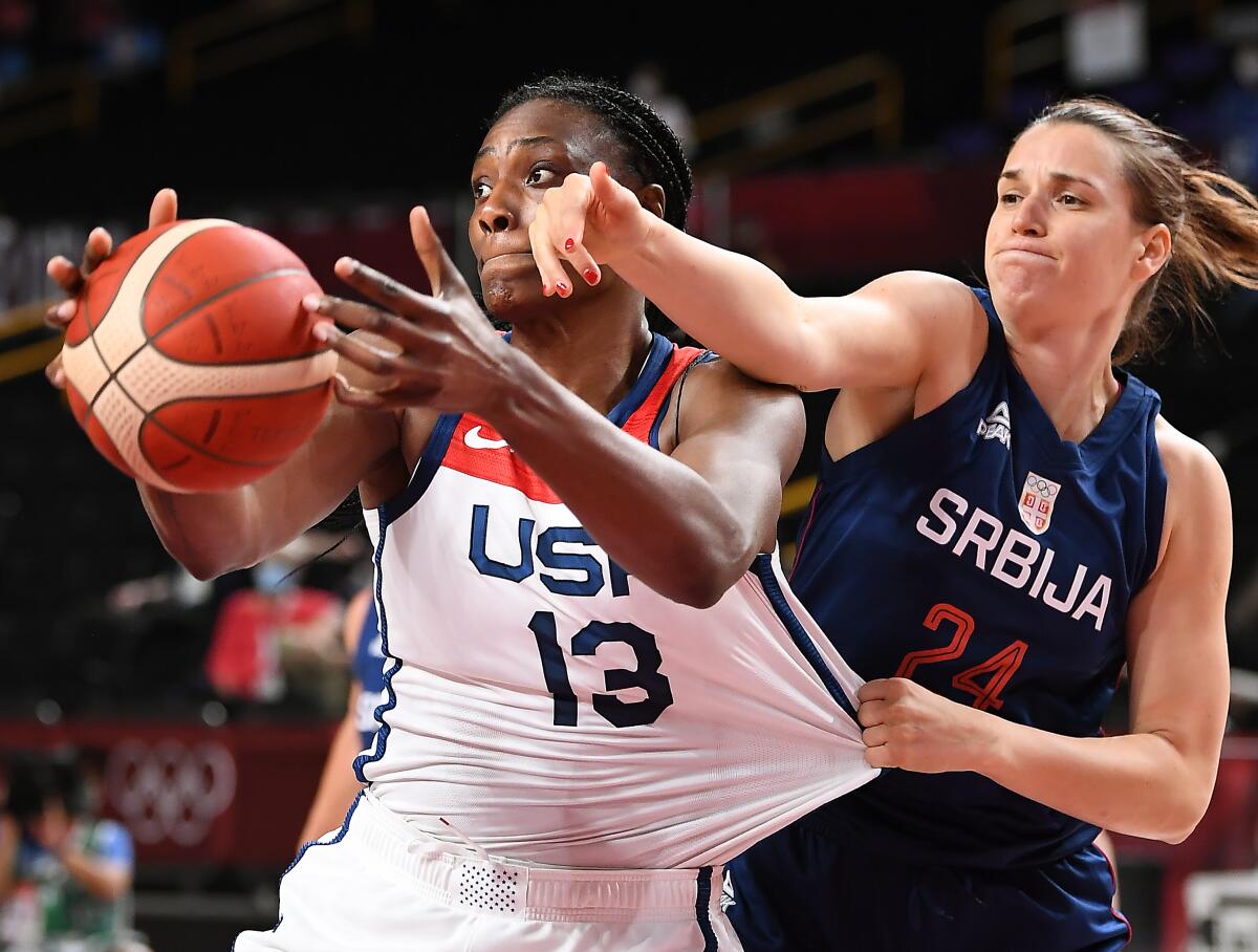 -TOKYO,JAPAN August 6, 2021: USA's Sylvia Fowles has her jersey grabbed.