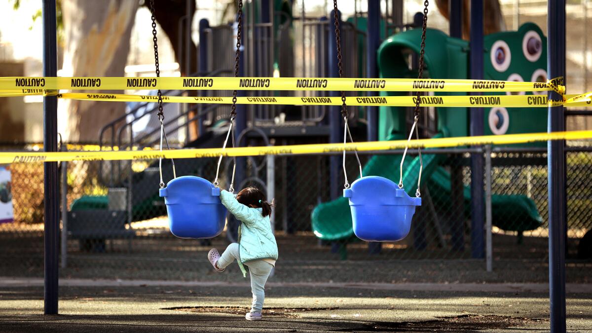 Empty playground, closed due to corona virus, forbidden to enter