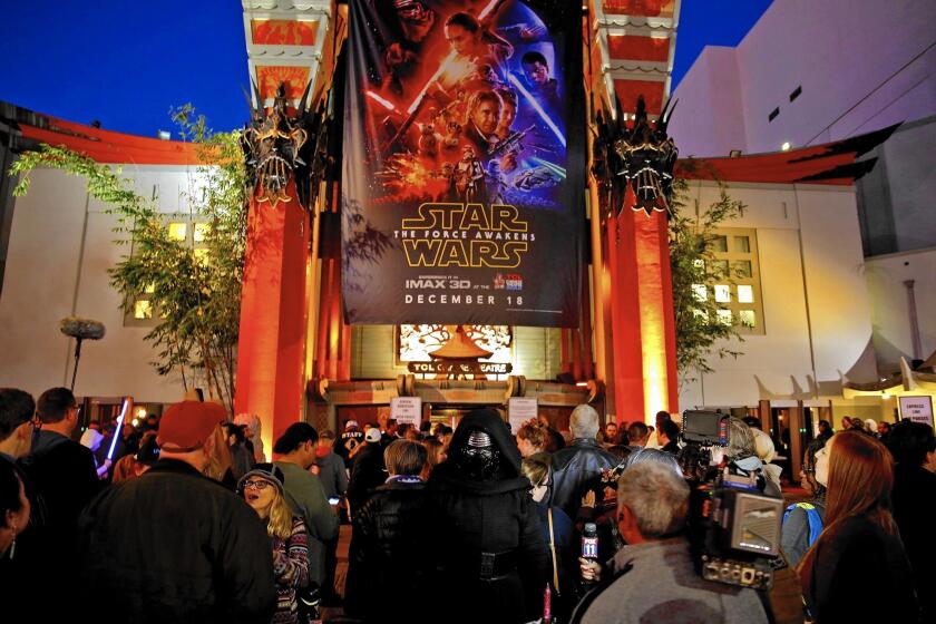 “Star Wars: The Force Awakens” sold a record $57 million in tickets Thursday. Above, fans at the TCL Chinese Theatre.