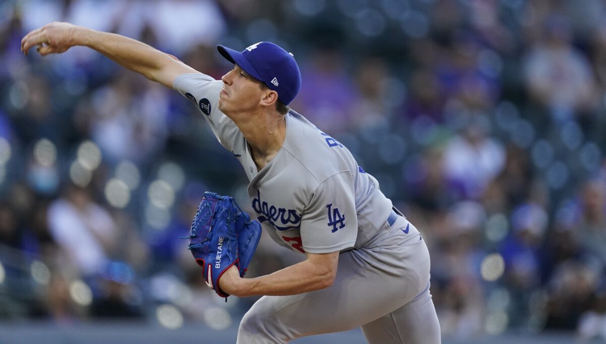 Los Angeles Dodgers starting pitcher Walker Buehler (21) in the first inning of a baseball game Saturday, April 3, 2021.