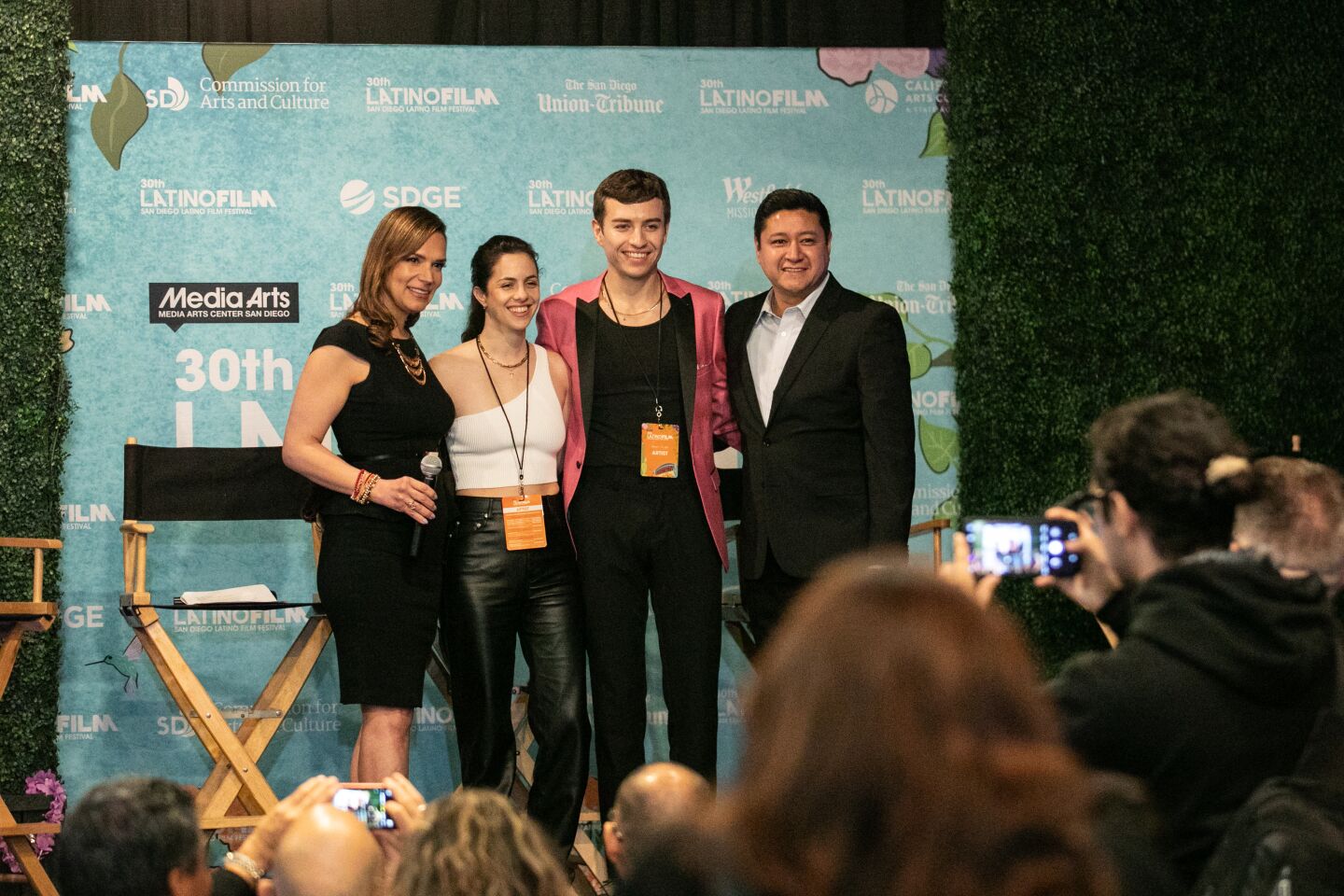 Paola Hernandez-Jiao (far left) and Luis Cruz (second from left) of The San Diego Union-Tribune host a discussion with Fiorella Vescovi (center) and Kyle Selby (far right), filmmakers of Mal de Amores, during opening night of the 30th annual San Diego Latino Film Festival at Westfield Mission Valley Mall in San Diego, CA on Thursday, March 9, 2023.