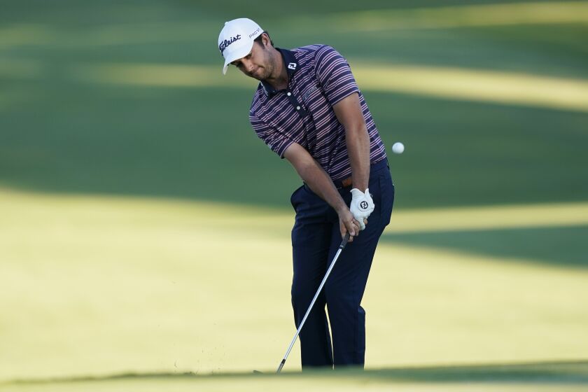 Davis Riley hits onto the 18th green during the first round of the Sanderson Farms Championship golf tournament in Jackson, Miss., Thursday, Sept. 29, 2022. (AP Photo/Rogelio V. Solis)