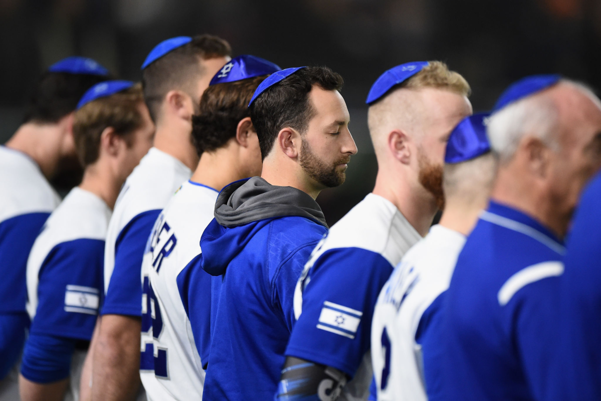 Israel players line up for the national anthem before a game in the World Baseball Classic.
