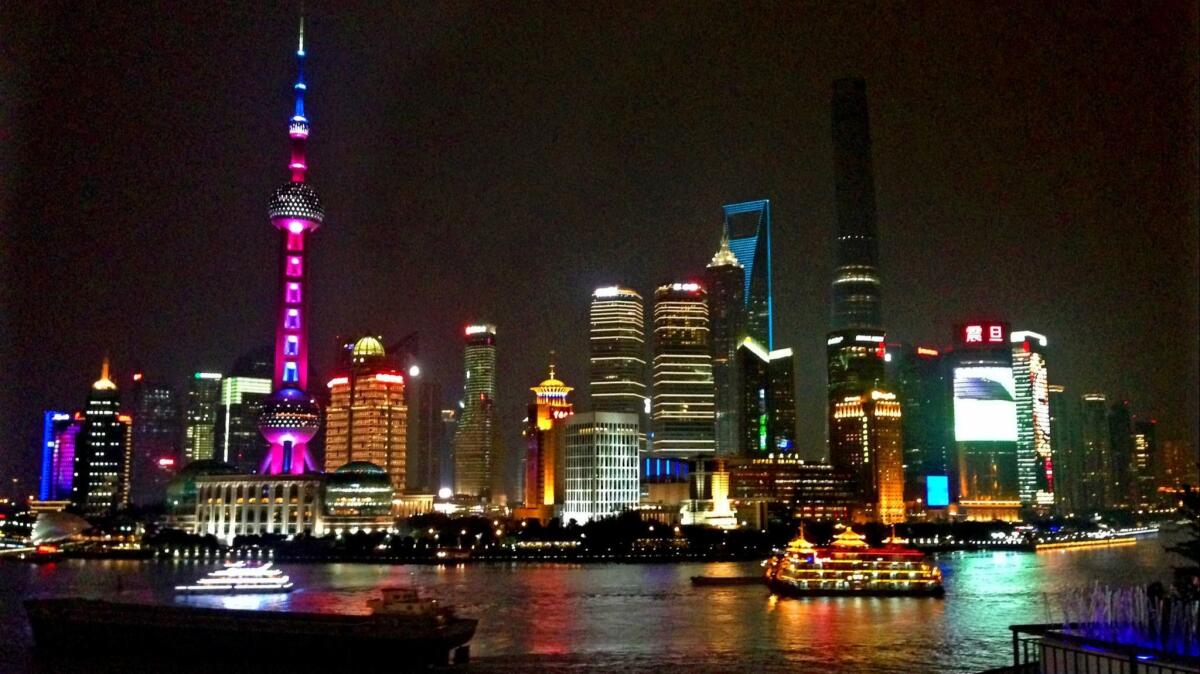 The high-rise buildings of Pudong, on the east bank of the Huangpu River in central Shanghai, as seen from the Bund.