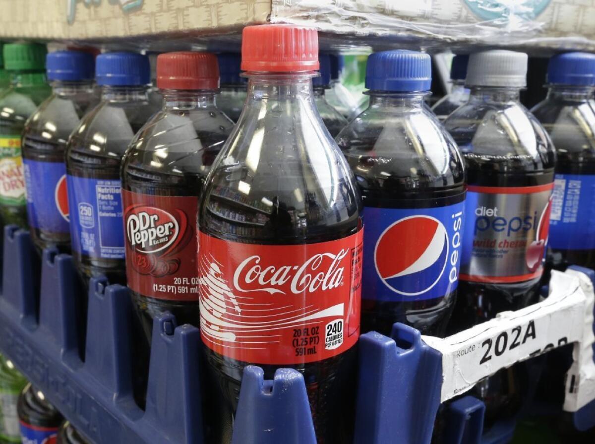 A California bill would require health warnings on sodas and other sugar-sweetened beverages.