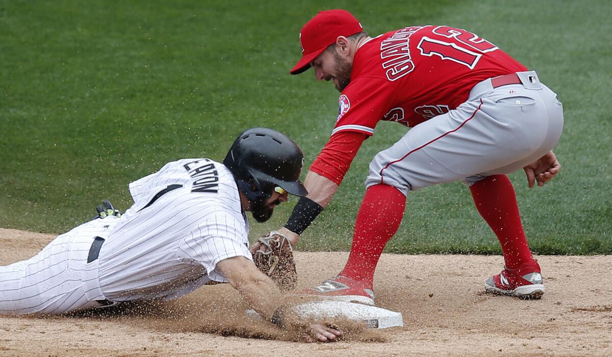 White Sox outfielder Adam Eaton steals second base against Johnny Giavotella and the Angels during a game last season.