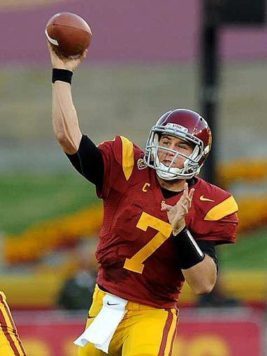 Trojans quarterback Matt Barkley, who completed 28 of 45 passes for 284 yards and three touchdowns with one interception, unloads a pass in the first half against the Cardinal on Saturday evening at the Coliseum.