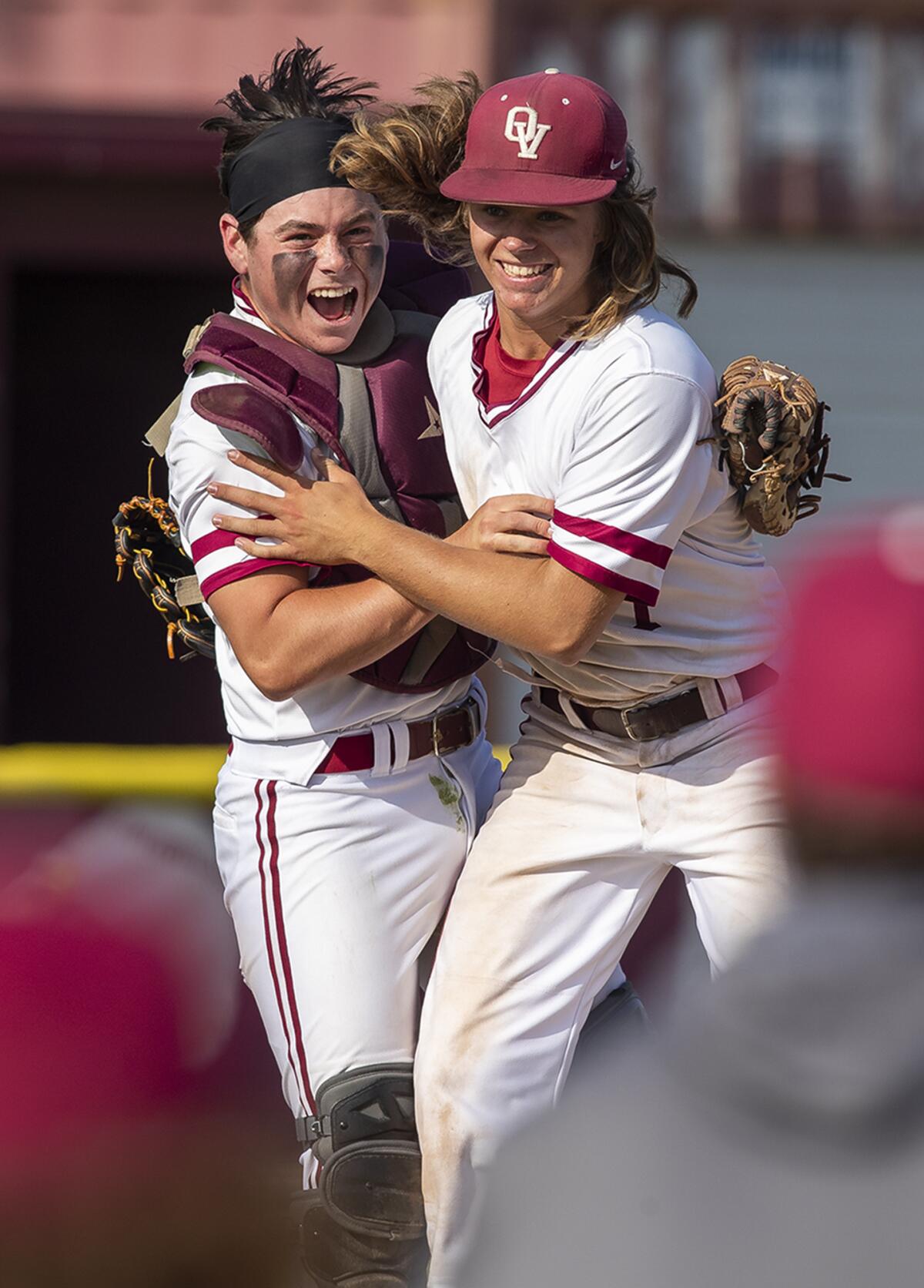 Ocean View's Evyn Lewis, left, and Spencer Johnsen celebrate after Johnsen threw a no-hitter against Segerstrom.  
