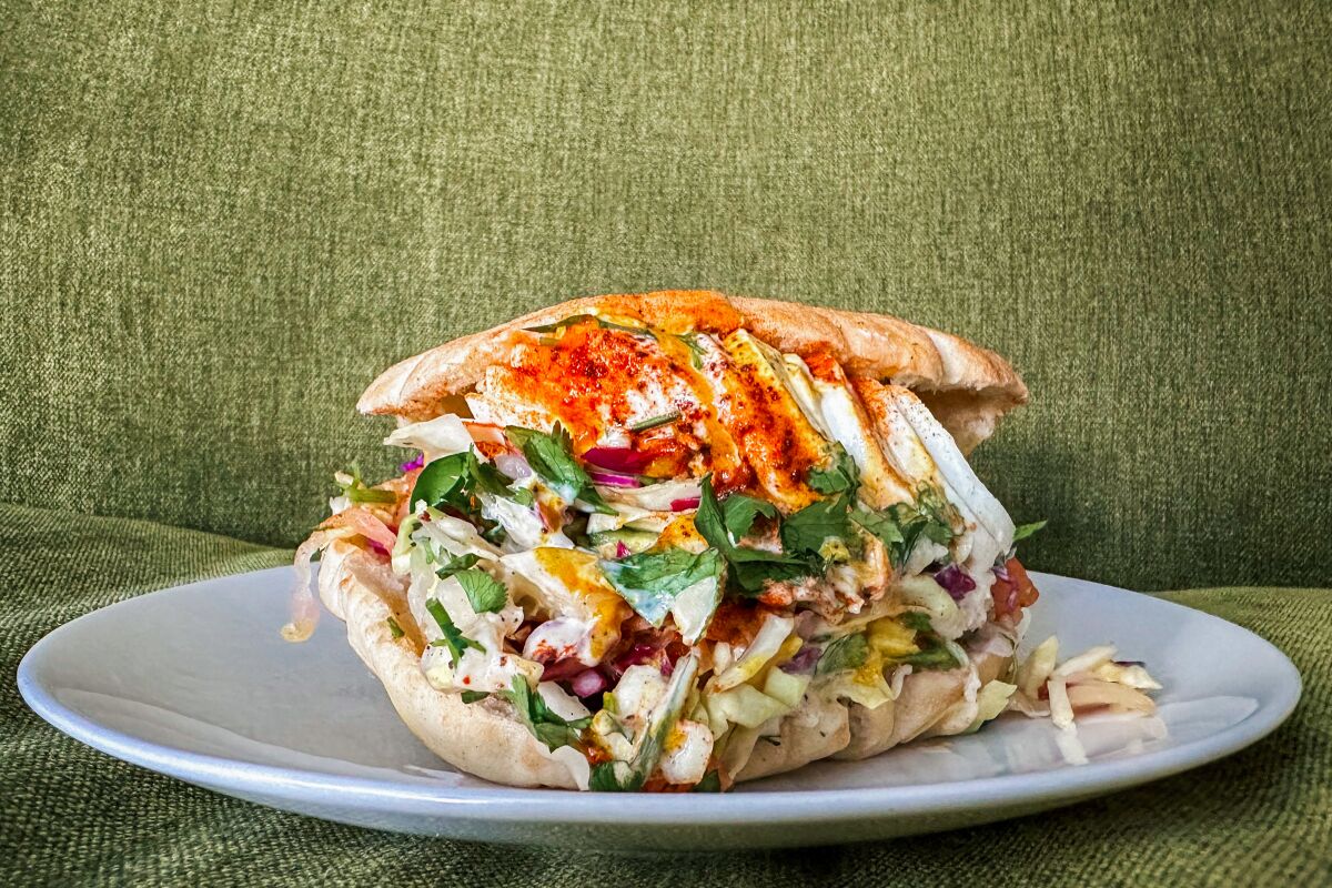 The Sabich from Vicky's All Day in West Adams includes fried eggplant, slaw, sliced egg, amba (mango pickle) and tahini stuffed into a pita.