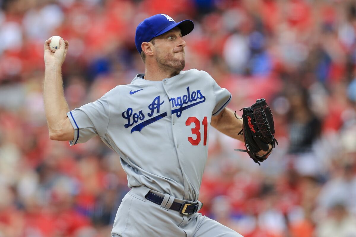 The Dodgers' Max Scherzer pitches during the sixth inning against the Cincinnati Reds on Sept. 18, 2021.
