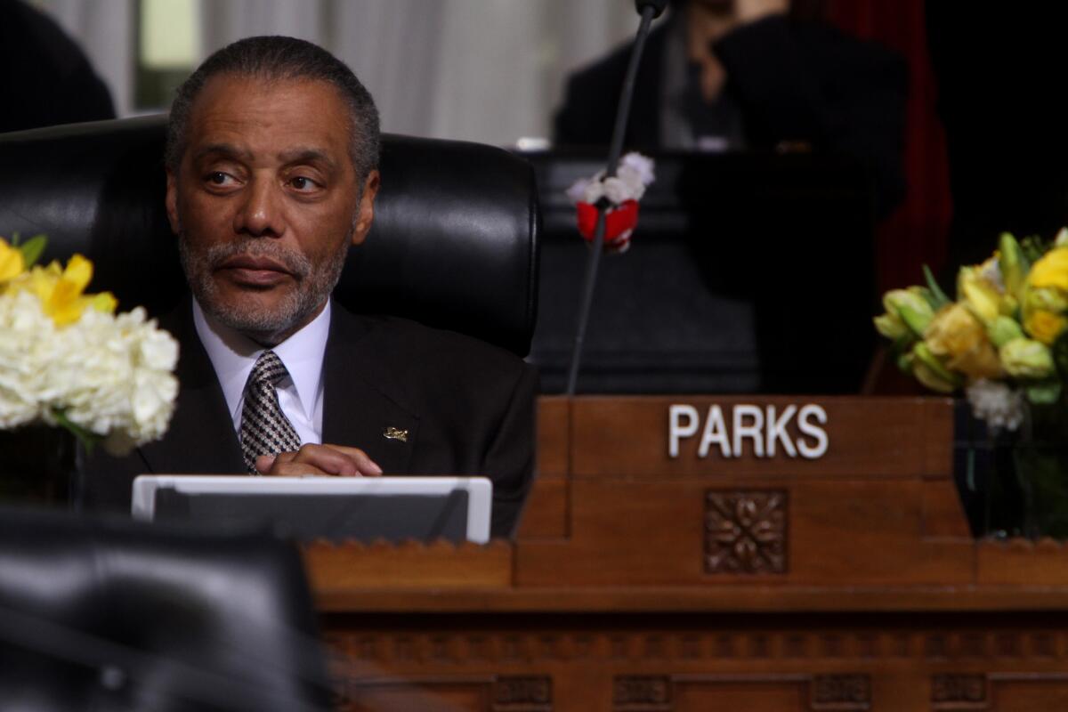 City Councilman Bernard Parks listens during a Los Angeles City Council meeting in March 2012.