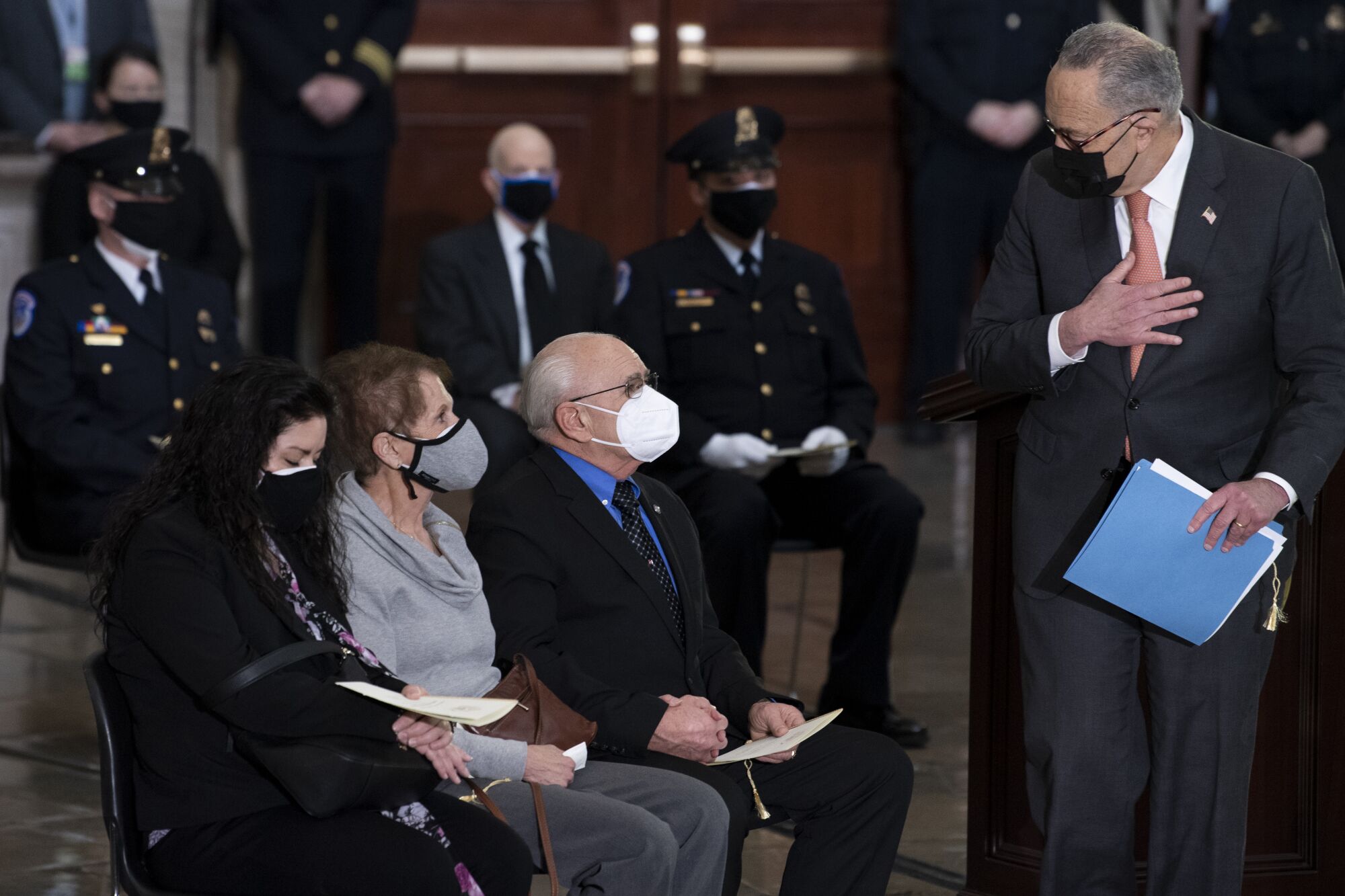 Senate Majority Leader Chuck Schumer with mourners