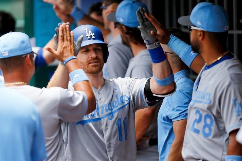 CINCINNATI, OH - JUNE 18: Logan Forsythe #11 of the Los Angeles Dodgers celebrates with teammates after hitting a two-run home run in the third inning against the Cincinnati Reds at Great American Ball Park on June 18, 2017 in Cincinnati, Ohio. (Photo by Michael Reaves/Getty Images) ** OUTS - ELSENT, FPG, CM - OUTS * NM, PH, VA if sourced by CT, LA or MoD **