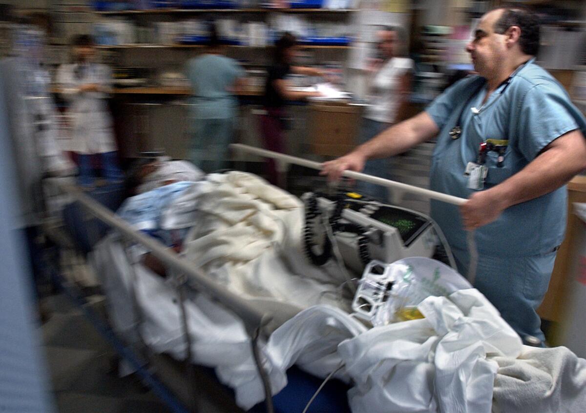  A trauma patient is rushed into the emergency room at Harbor-UCLA Medical Center. 