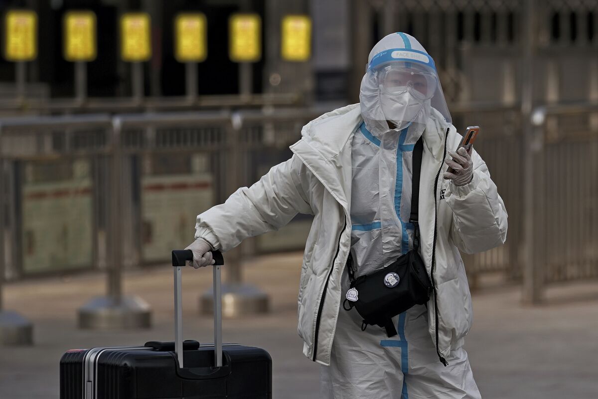 A woman in protective gear in Beijing