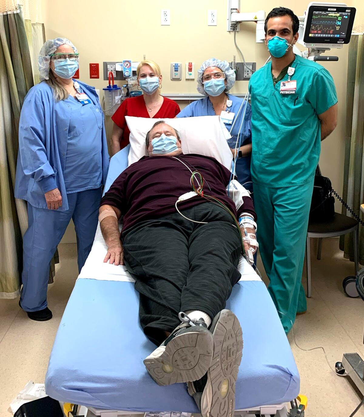 Dwight Everett, a recovered COVID-19 patient, awaits his blood draw at St. John's Pleasant Valley Hospital in Camarillo. Plasma from the 65-year-old retired electrician went to Ron Shirley, an 80-year-old retired gas company planner who was being ravaged by the same disease.