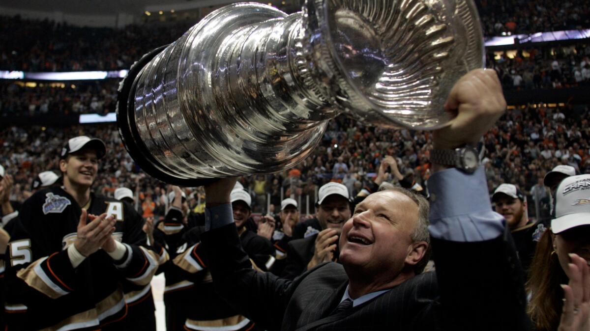 Randy Carlyle hoists the Stanley Cup after the Ducks' 2007 championship.