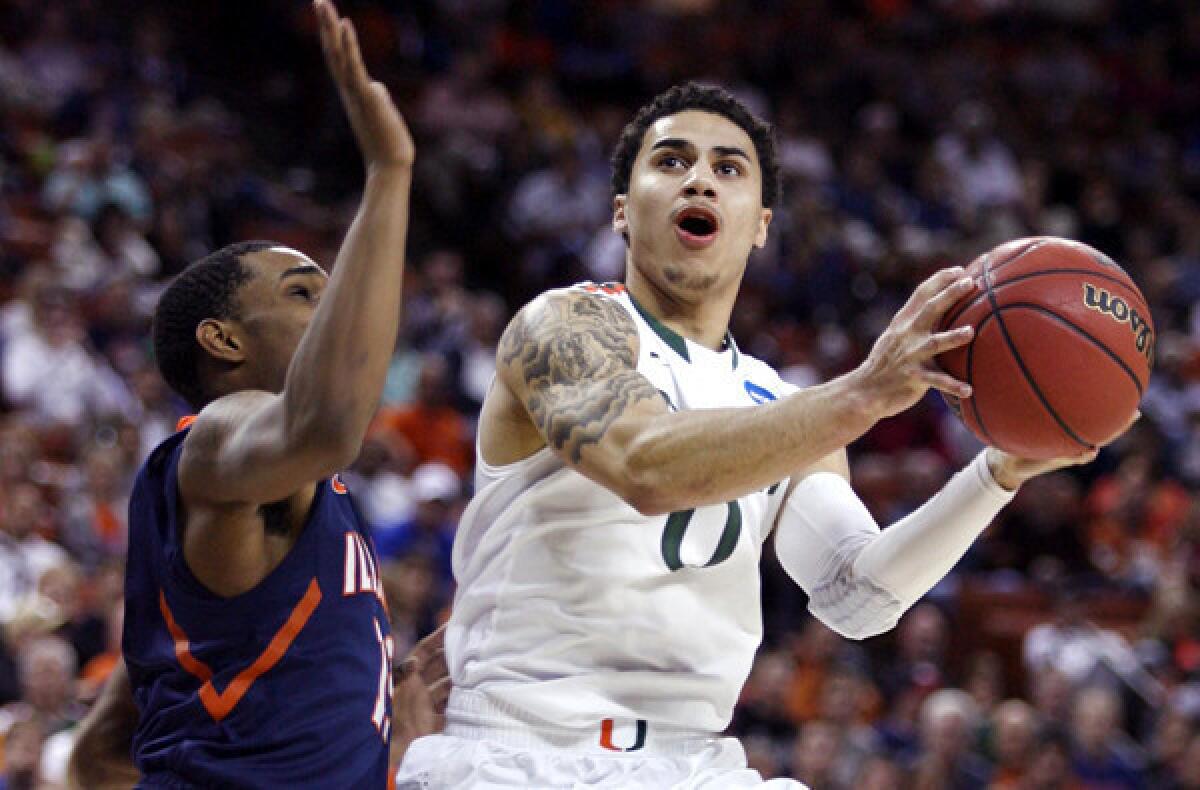 Miami's Shane Larkin is one of six point guard who worked out with the Clippers on Wednesday.