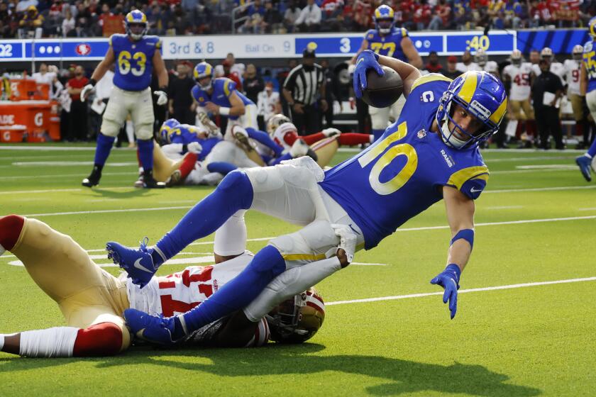 INGLEWOOD, CA - JANUARY 9, 2022: Los Angeles Rams wide receiver Cooper Kupp (10) lurches for the end zone.