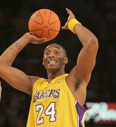 Kobe Bryant looks to pass against the Minnesota Timberwolves during first quarter action at Staples Center on Tuesday.