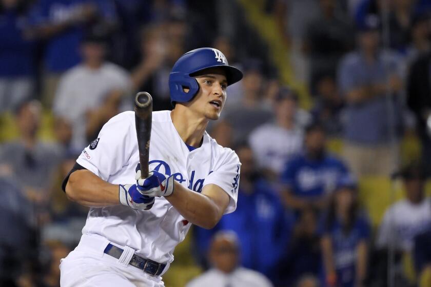 Los Angeles Dodgers' Corey Seager hits a double during the ninth inning of a baseball game against the Toronto Blue Jays Thursday, Aug. 22, 2019, in Los Angeles. (AP Photo/Mark J. Terrill)