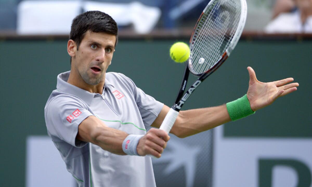 Novak Djokovic returns a shot during his third-round victory over Alejandro Gonzalez at the BNP Paribas Open at Indian Wells on Tuesday.