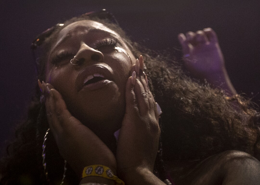 A fan is brought to tears while listening to Raveena perform at the Day N Vegas hip-hop music festival.