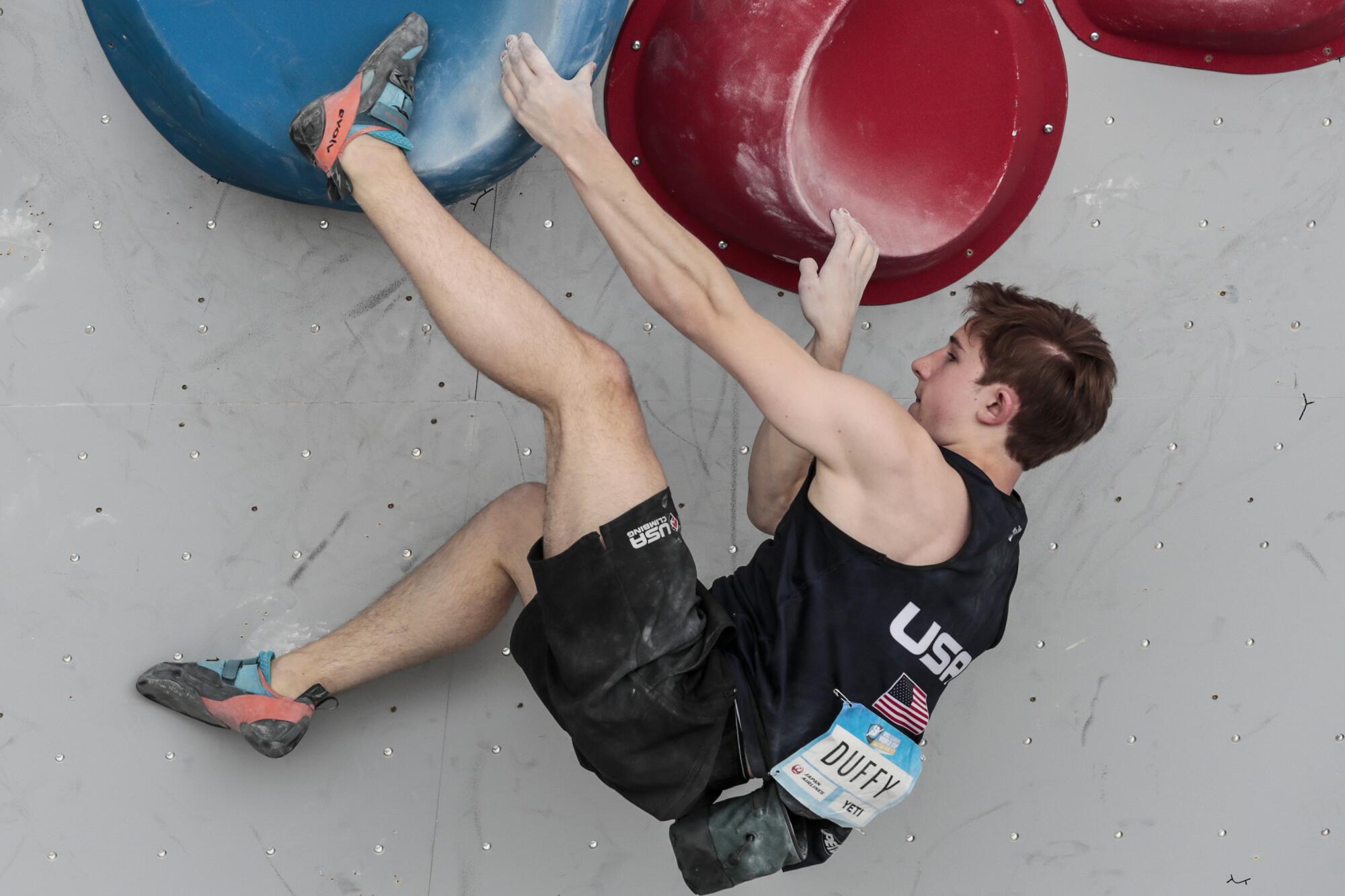 Colin Duffy competes in the IFSC Climbing World Cup at Industry SLC in May.