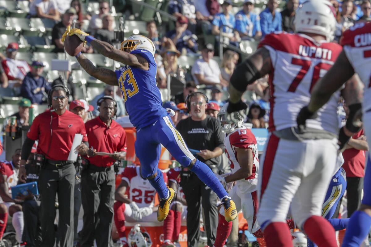 Chargers safety Derwin James intercepts a pass from Arizona Cardinals quarterback Josh Rosen in the second quarter at StubHub Center on Nov.25.