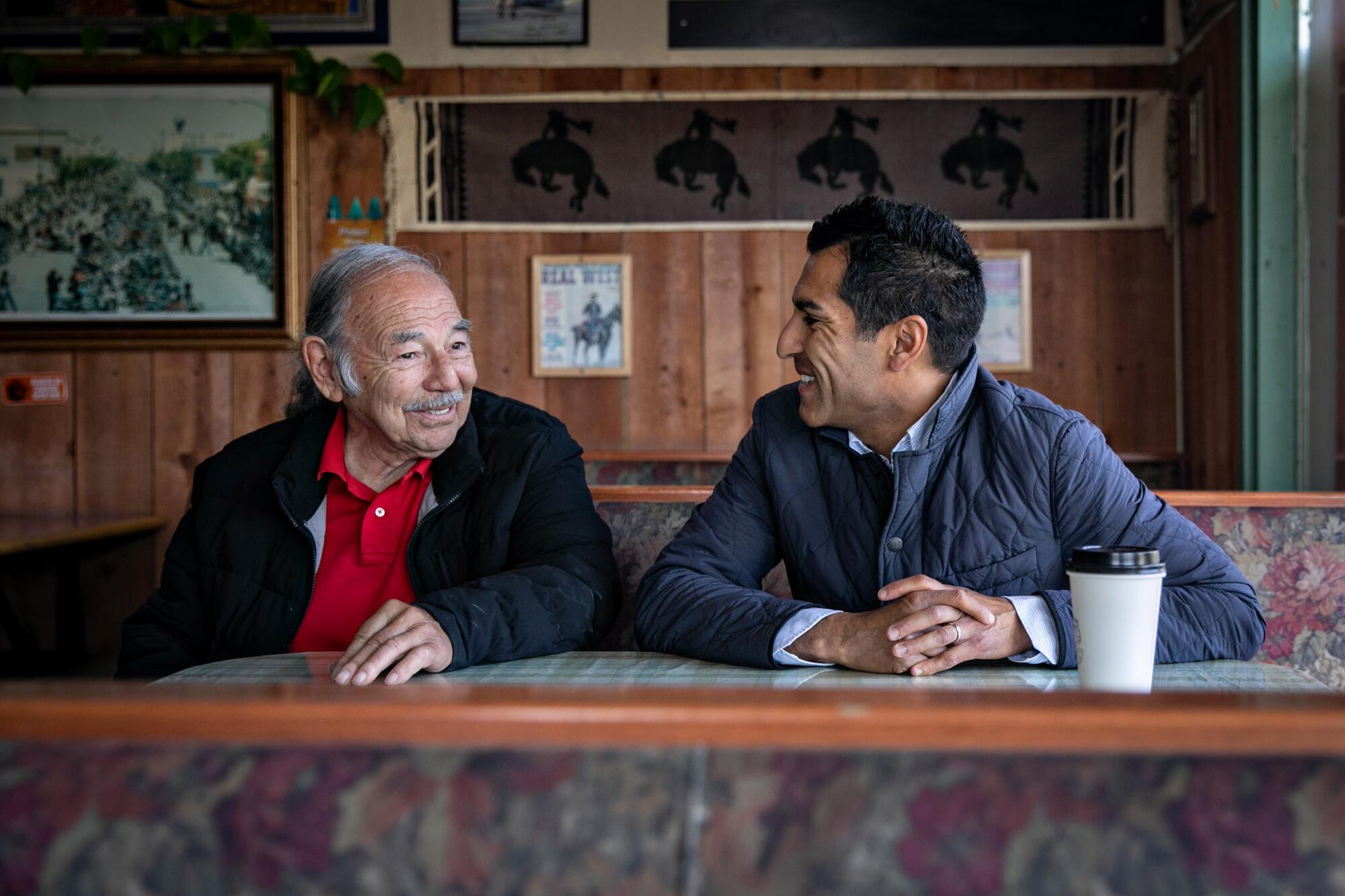 California Assembly Speaker Robert Rivas has a cup of coffee with Samuel Ramos.