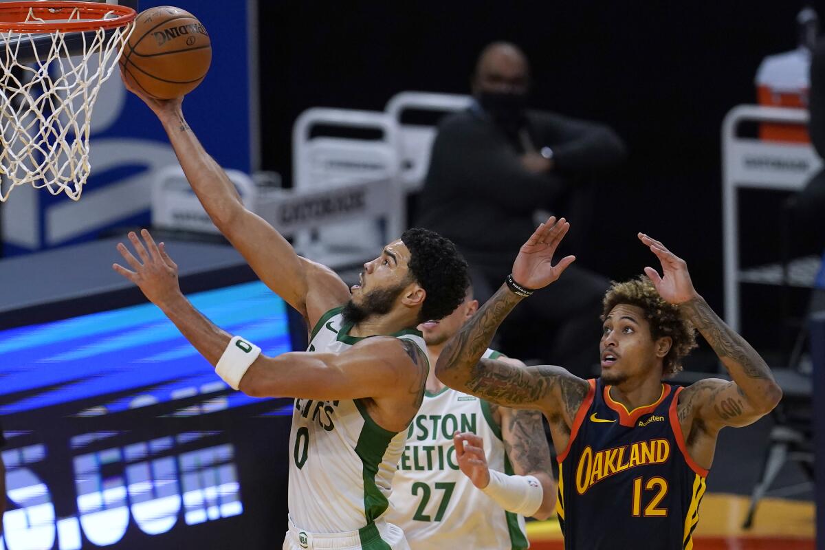 Celtics falter in fourth quarter, lose to Warriors 107-97 in Game