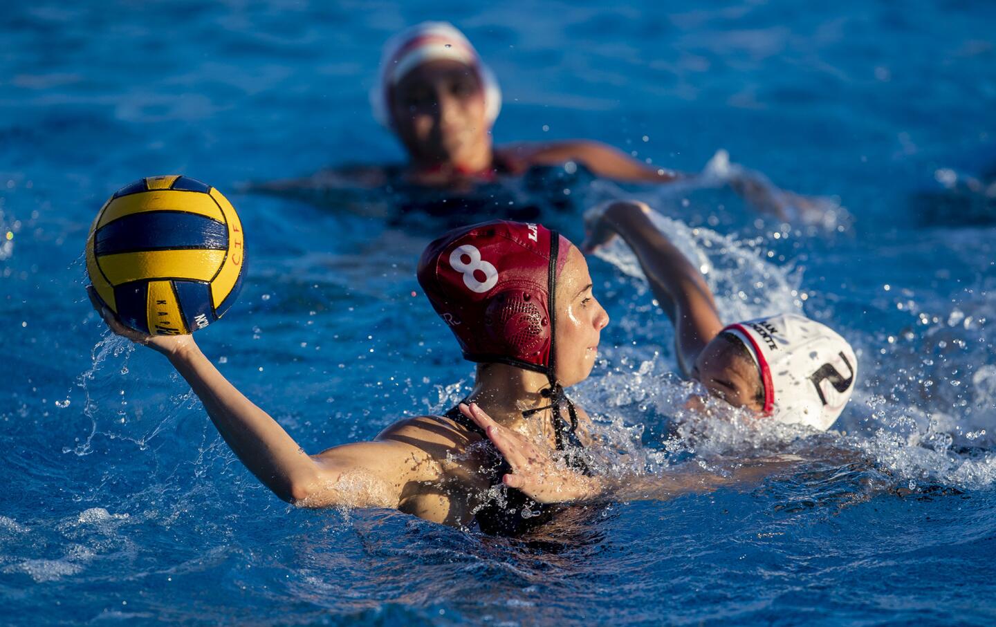 Laguna Beach High's Jessie Rose takes a shot under pressure from San Clemente's Brooklyn Aguilera during a CIF Southern California Regional Division I playoff opener on Friday at Segerstrom High.