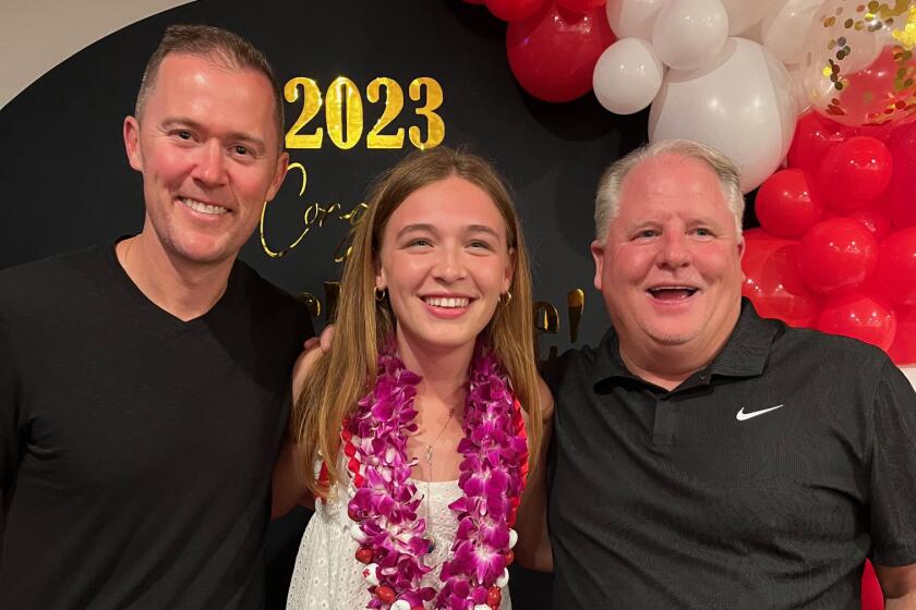 USC football coach Lincoln Riley, left, and UCLA football coach Chip Kelly, right, pose for a photo with Mackenzie McGovern.