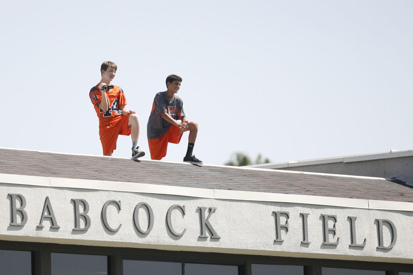 Pasadena Poly students film varsity's football game against Blair at Pasadena Poly on Saturday, September 8, 2012.