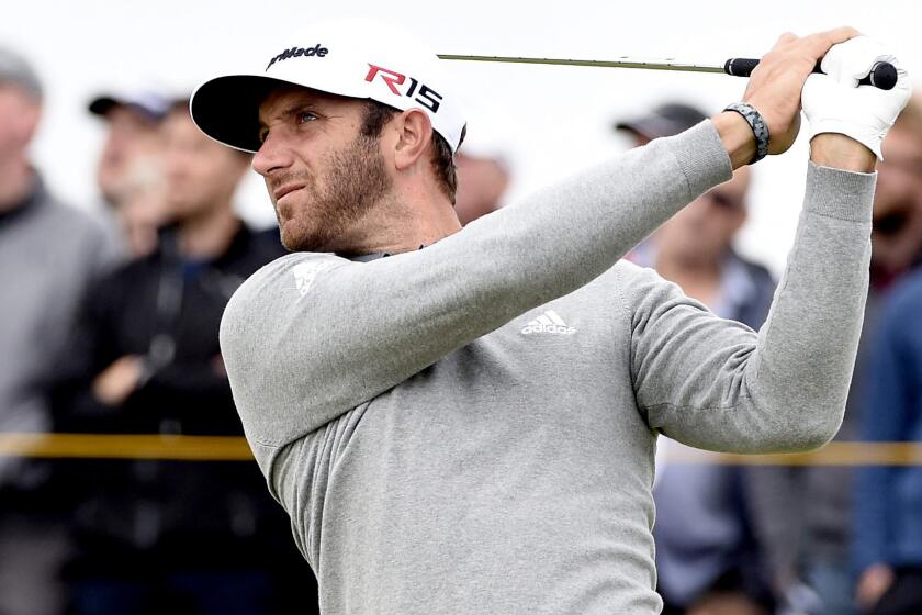 Dustin Johnson shot a 65 in the first round of the British Open on Thursday at St. Andrews' Old Course.